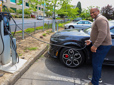 Mayor Stovall charging an electric vehicle in front of Gresham City Hall