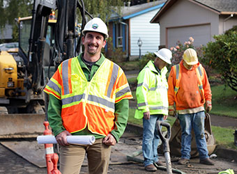 Photo of a civil engineer employee working on a construction project